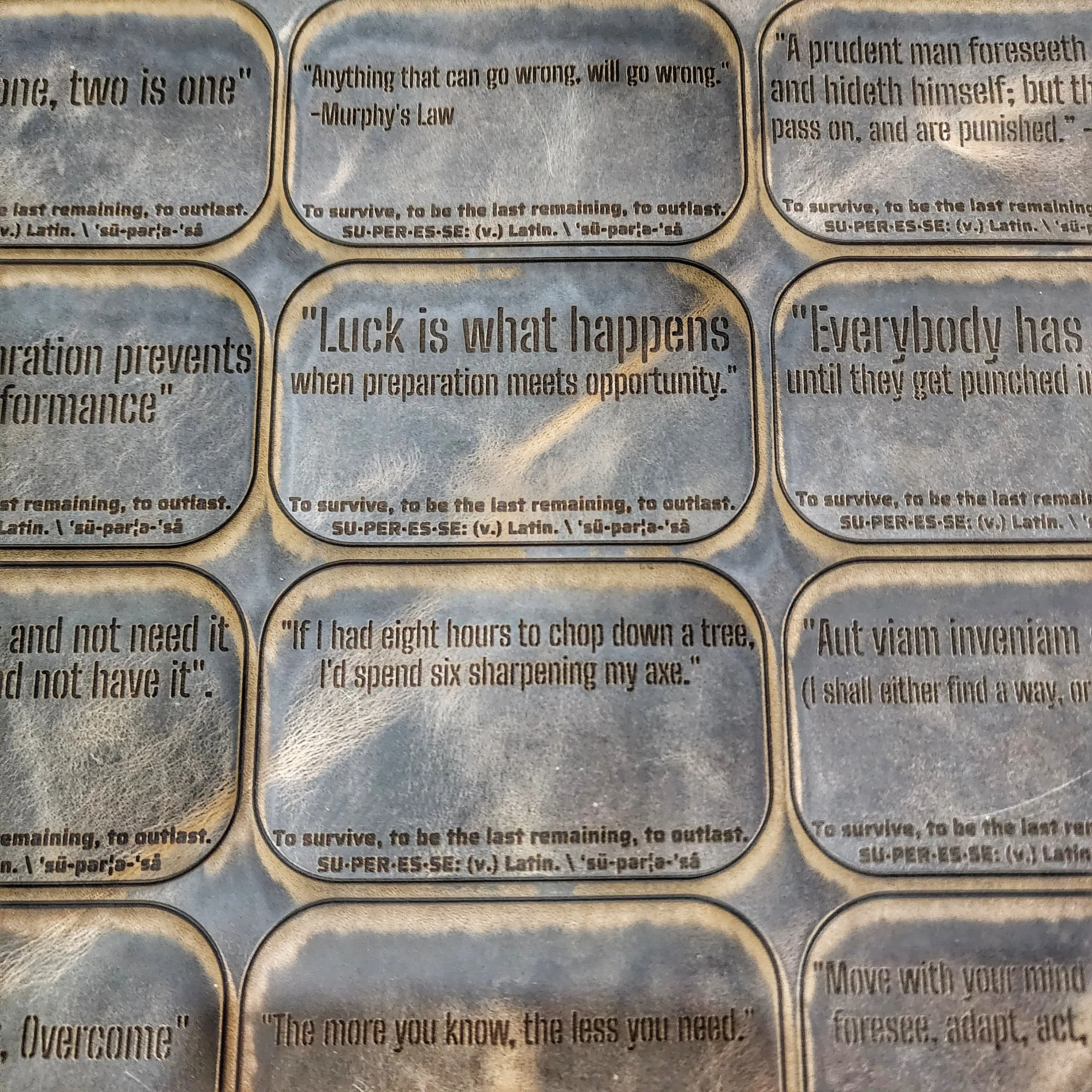 Leather Proverb Mat & Patch - Engraved Preparedness Quotes on a Tin Liner or Morale Patch.